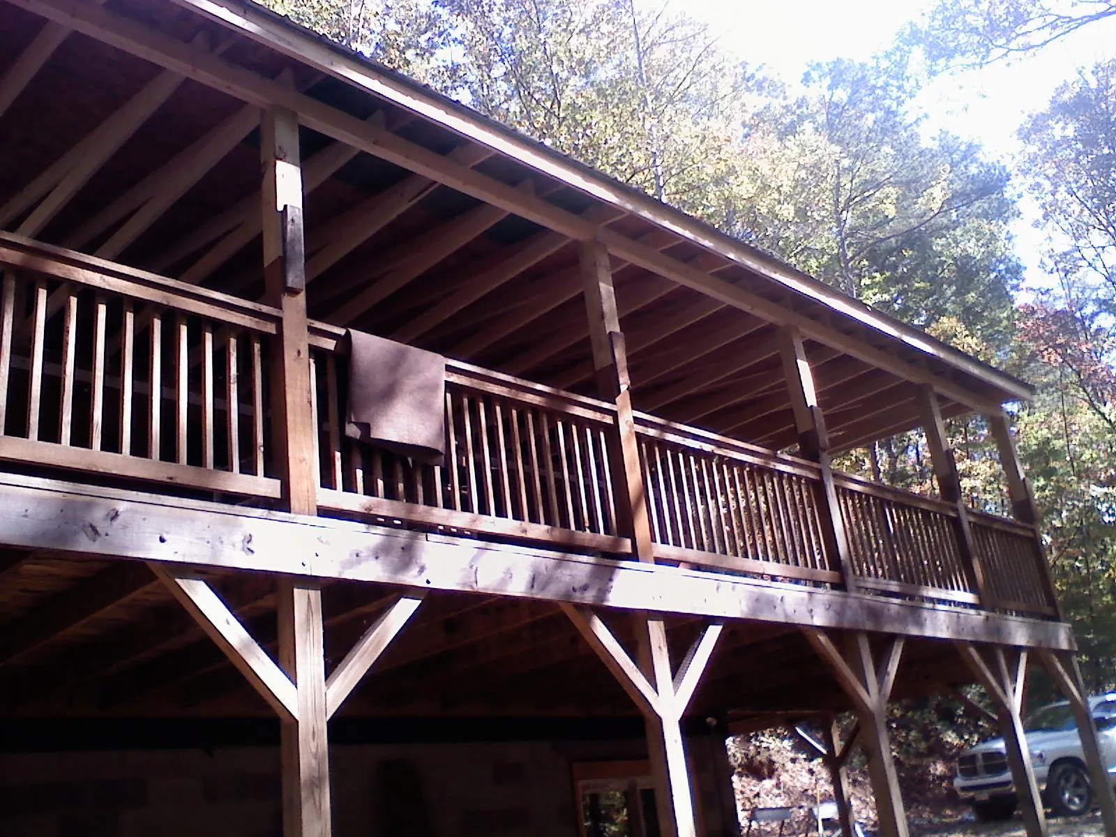 Timber framing under a new elevated porch and deck — Roof Leak Repair in East Orange by Roofing Brothers